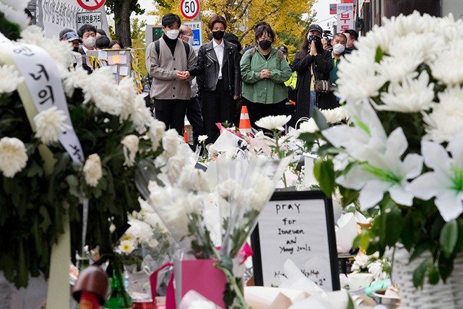 South Korean parents bury children killed in Halloween disaster ...