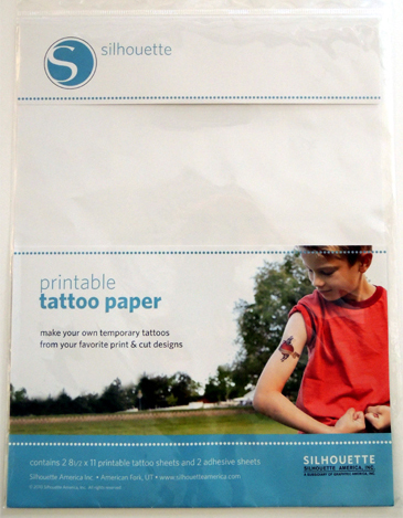 I used MidJourney, Photoshop, and printable temporary tattoo paper ...